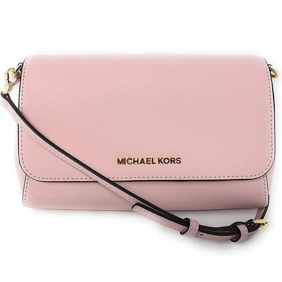 Michael Kors Handbags - EUC Michael Kors Jet Set Travel Large Leather Wallet Phone Crossbody Bag